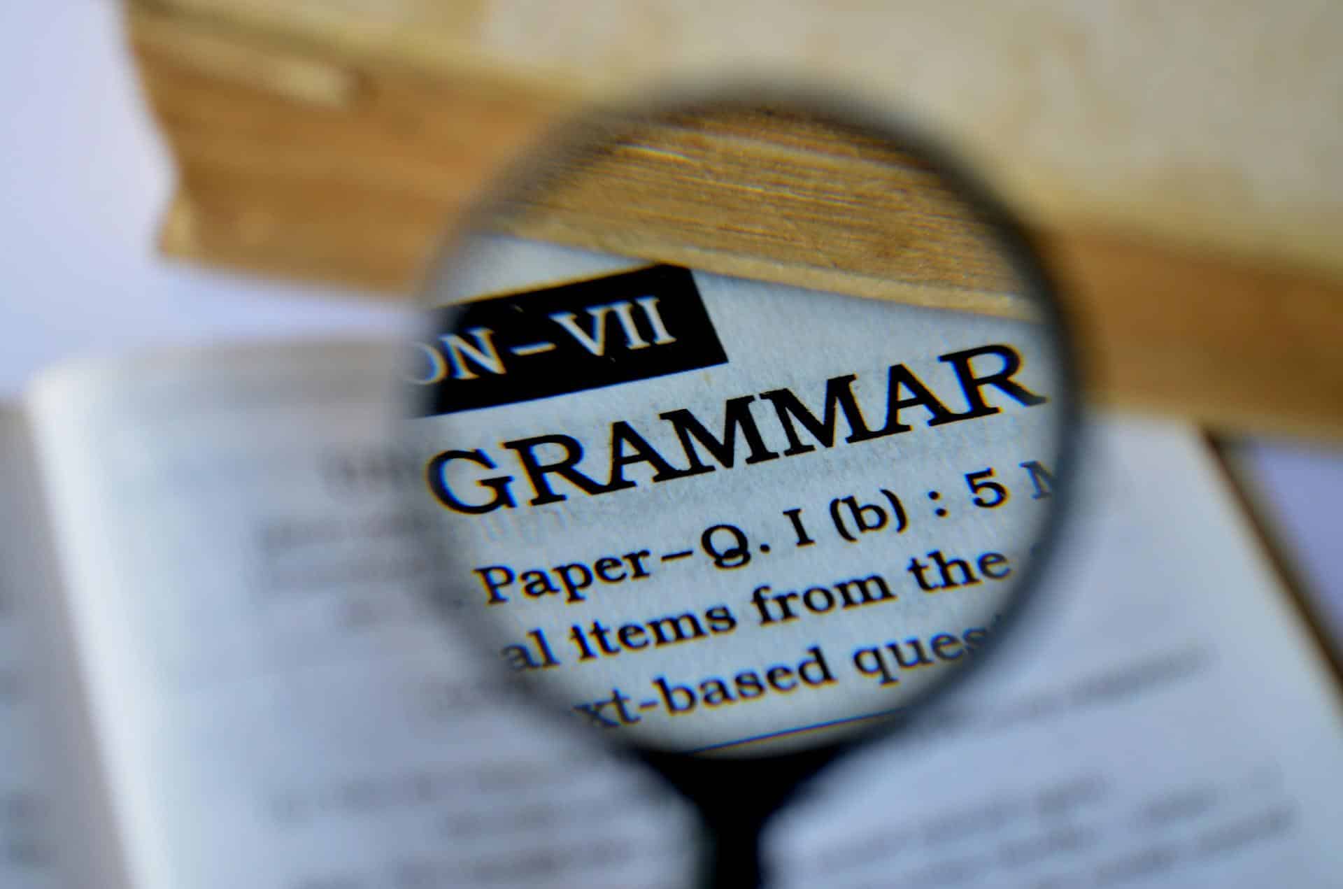 magnifying glass zoomed in on the word grammar